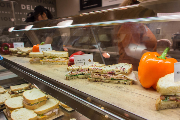 Sandwiches behind a glass display at Carte