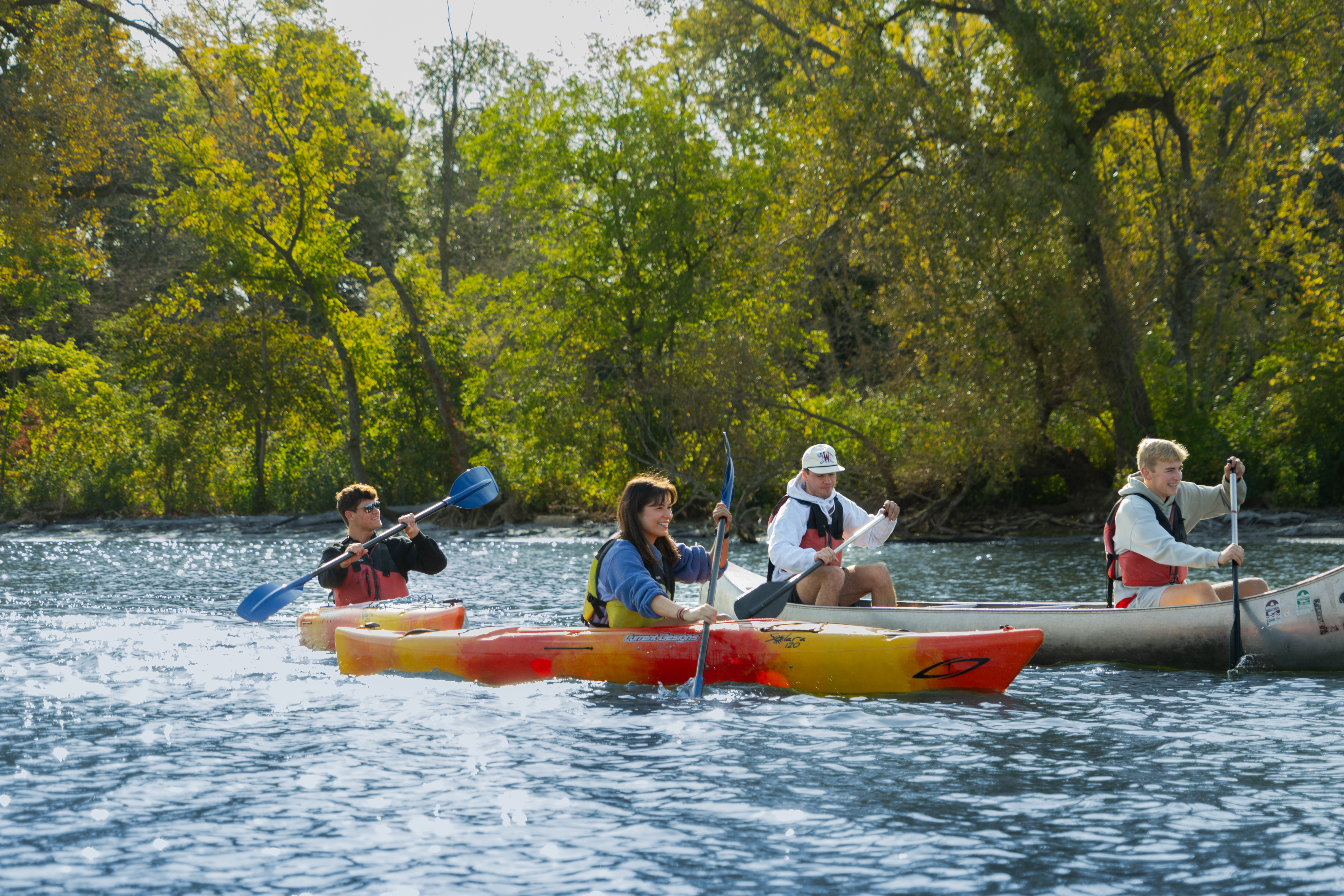 Students kayaking and canoeing on Lake Mendota