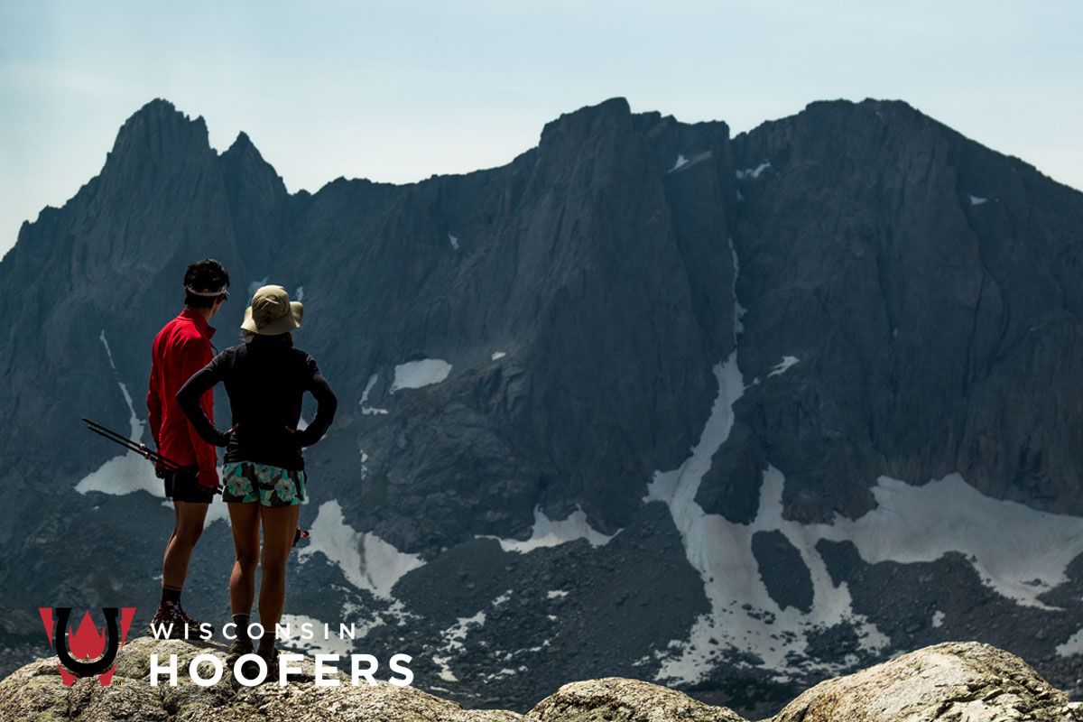 Wisconsin Hoofers: Photo of two people standing on a mountaintop
