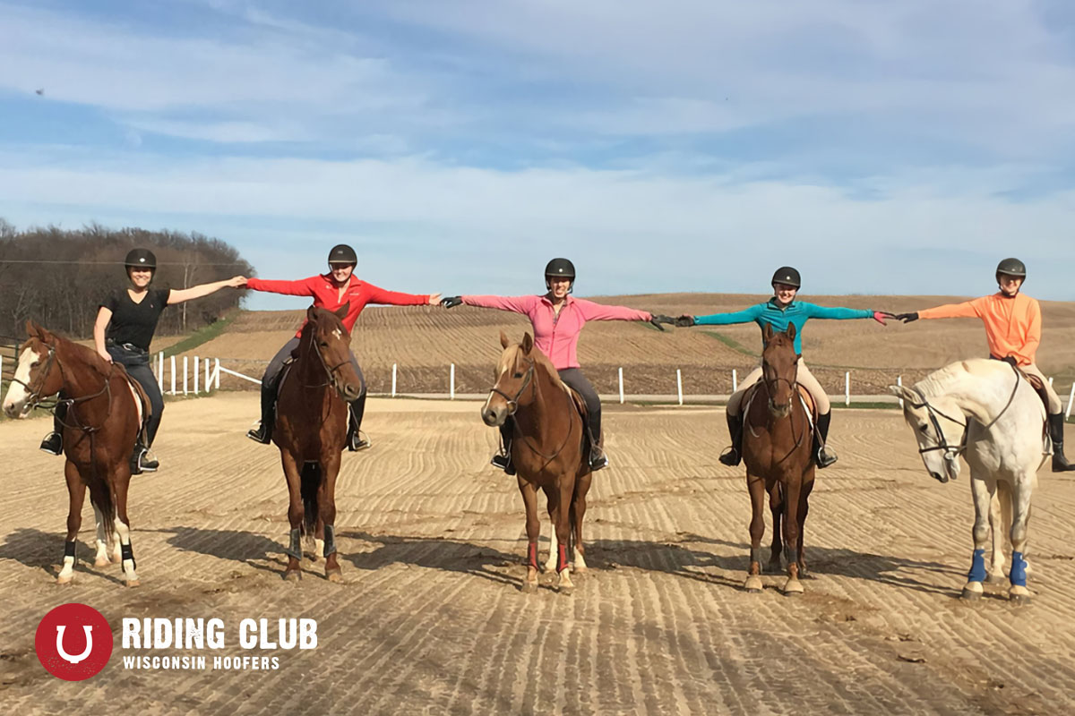 Hoofer Riding Club: Photo of 5 horseback riders holding hands