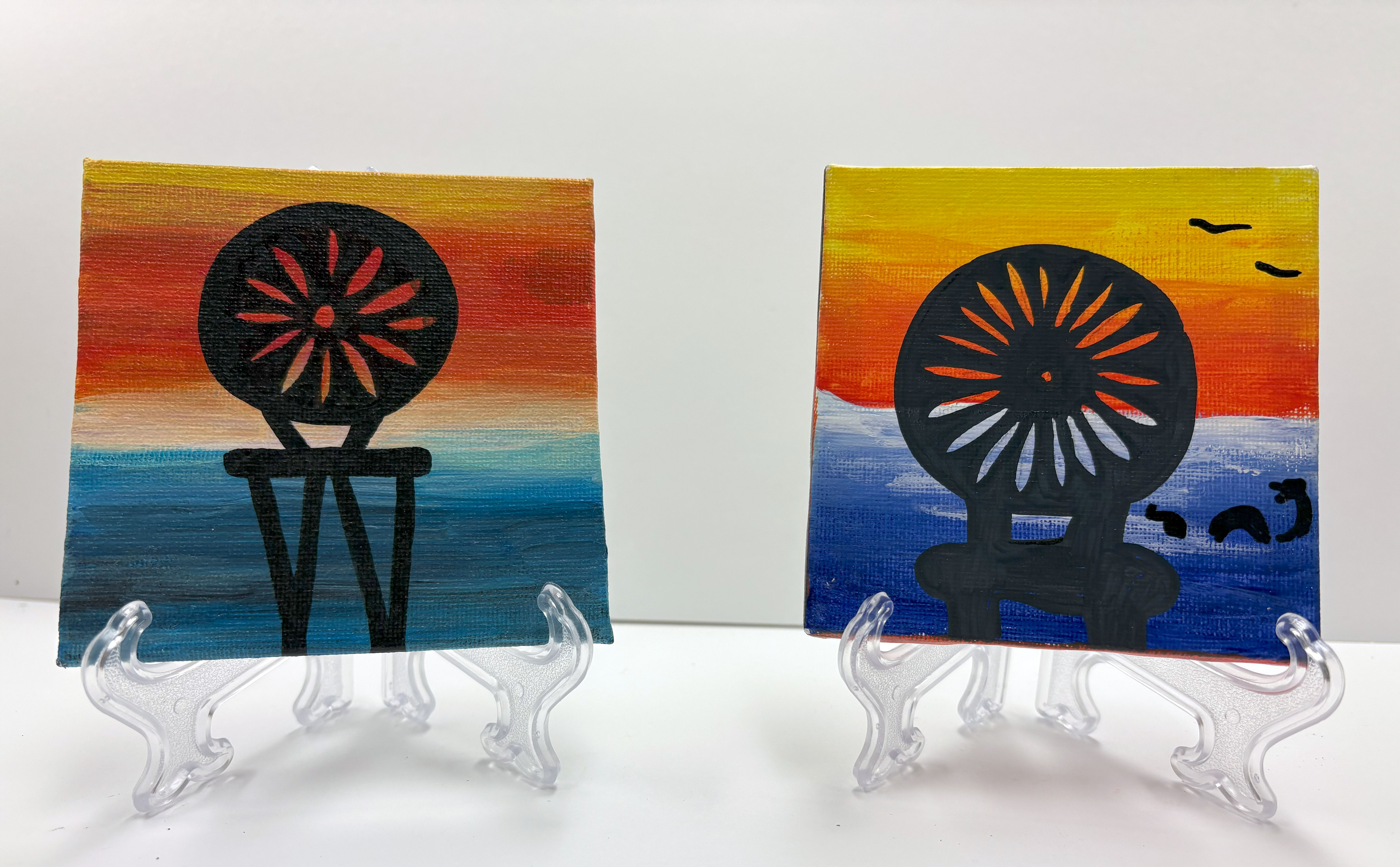 Two paintings of Terrace chairs at sunset.