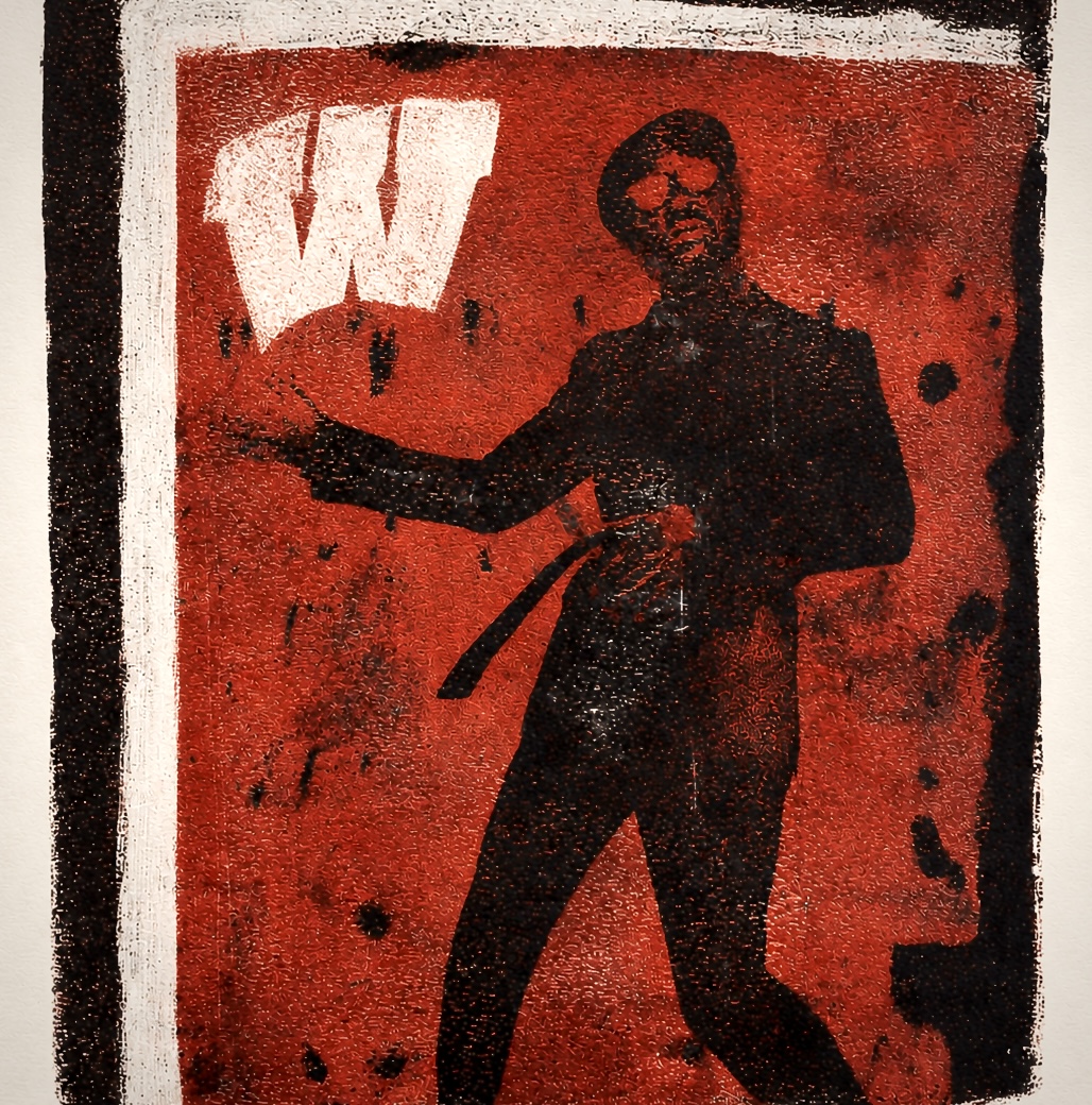 Photo of a printmaking piece with a W and a man. 
