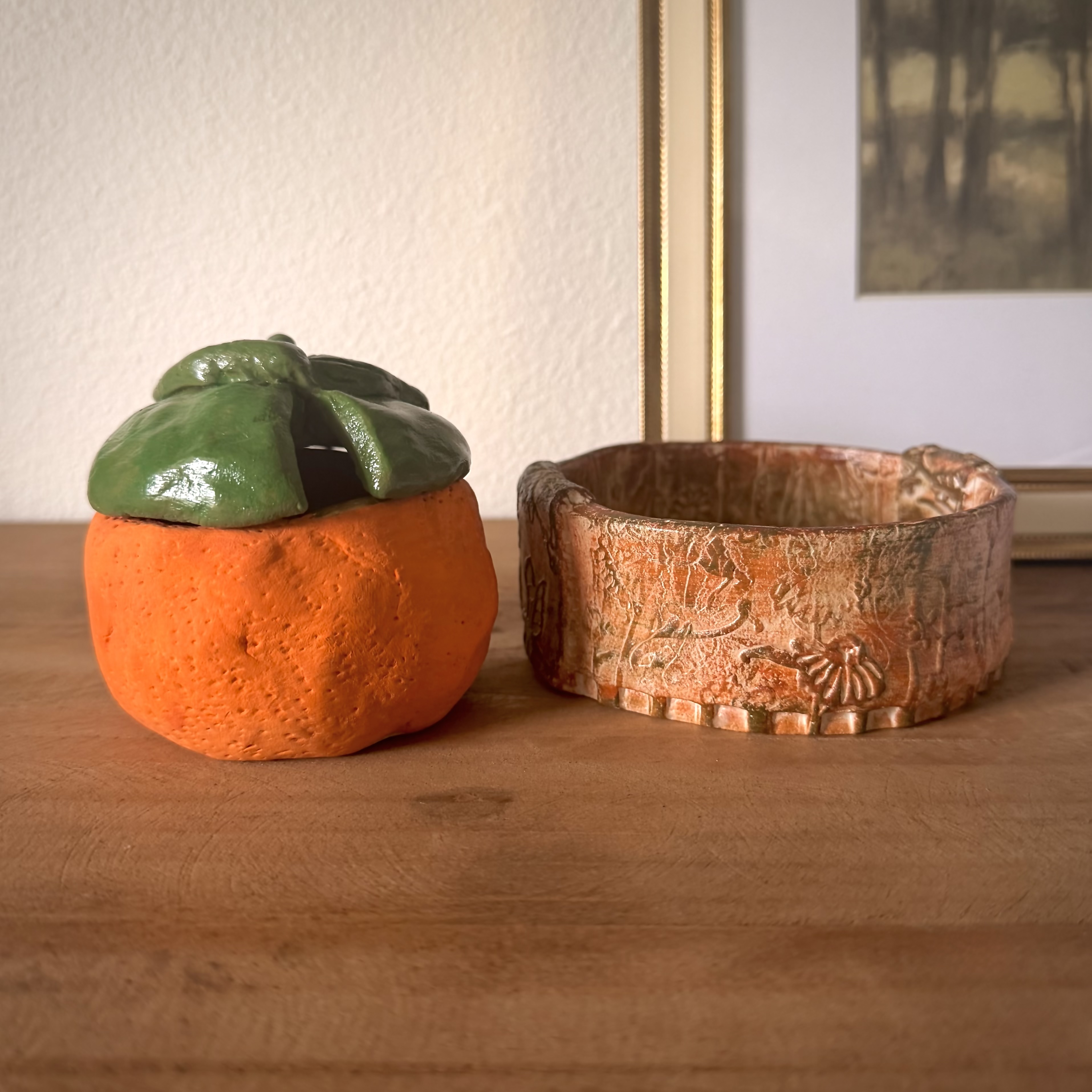 Photo of two clay pots.