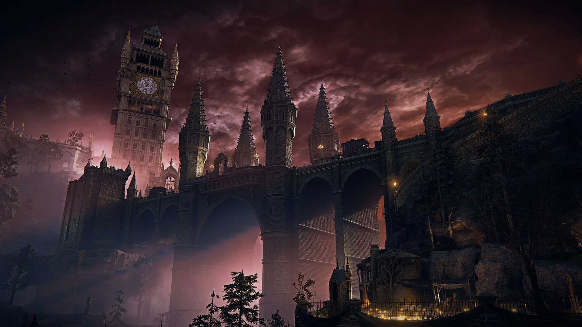 Ground level view of a bridge leading to a clocktower. 