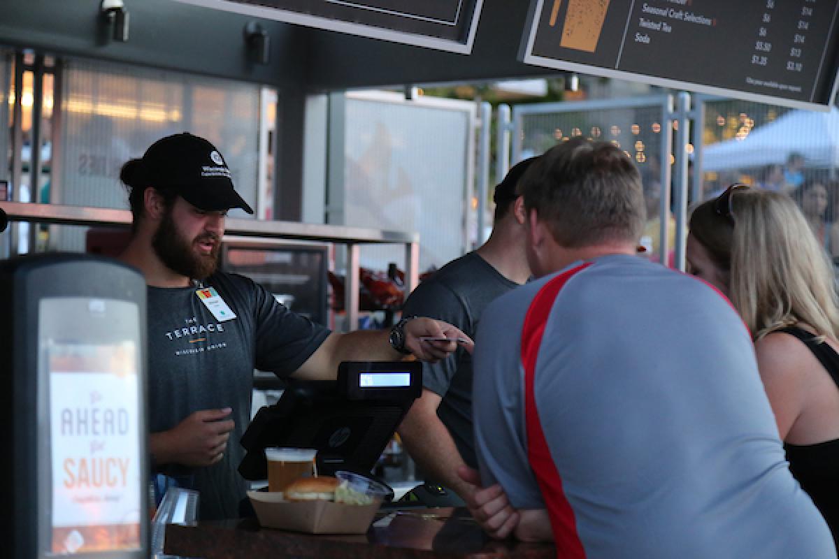 Taking a customer's order at the Brat Stand