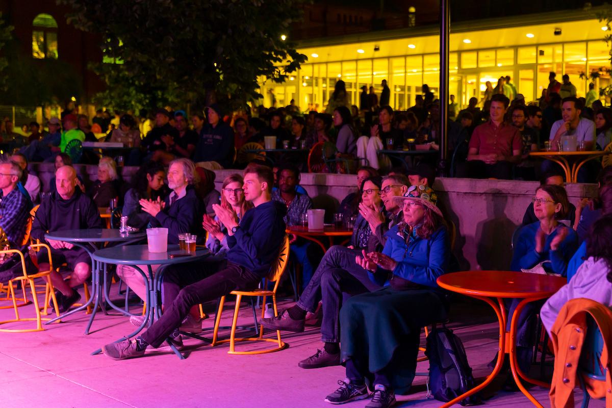 People gathered on the Terrace for a nighttime performance