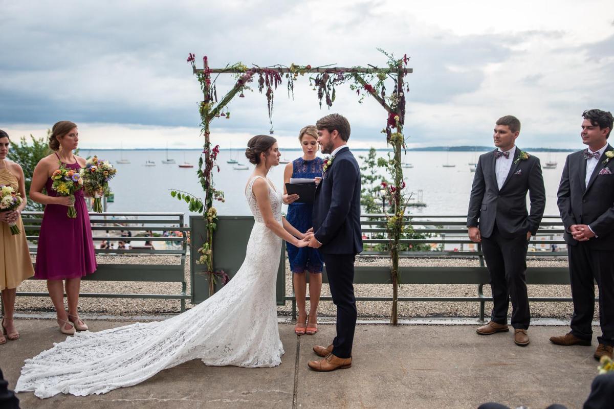 Bride and groom say their vows near Lake Mendota