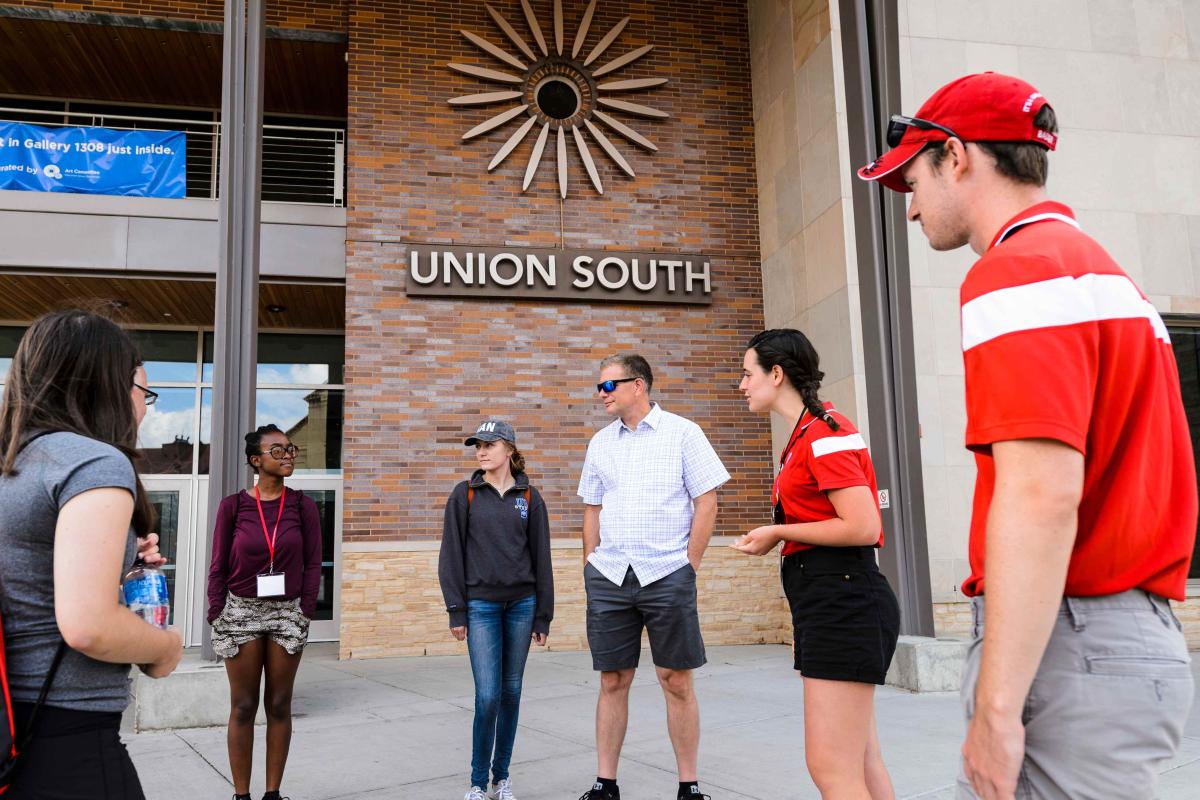 Students being greeted at the entrance of Union South