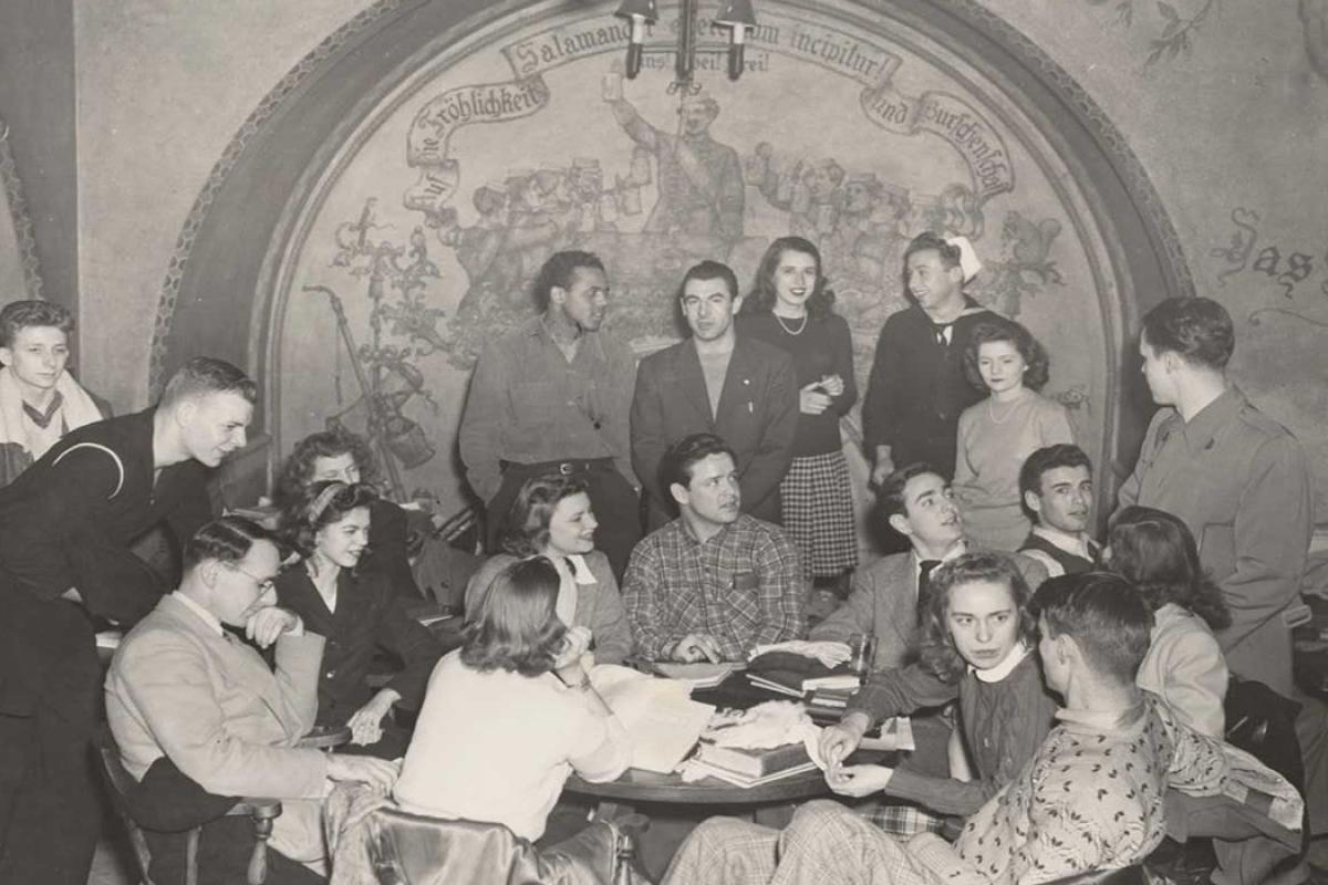 Black and white photo of students gathered at Der Rathskeller