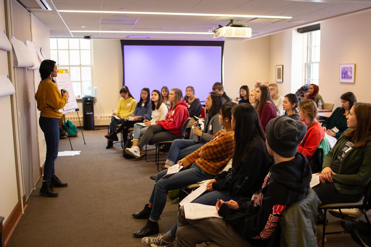 Students listen to a presentation at a WUD Alt Breaks Leader Retreat