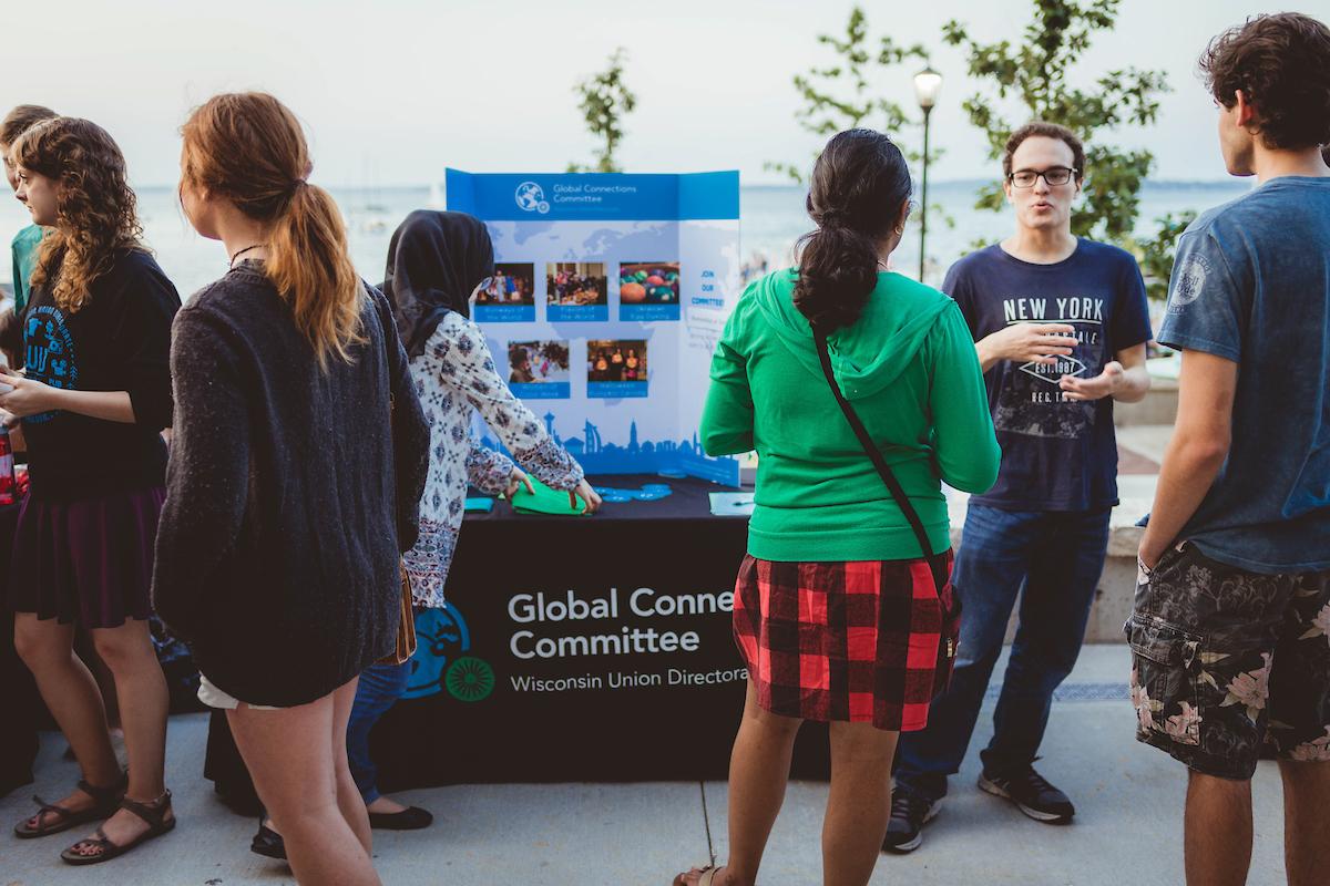 Students tabling by the lake for WUD GloCo during Sunset Slam 2017