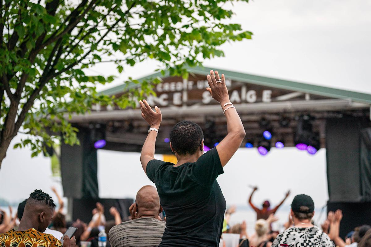 Crowd raising their hands at Jazz Fest 2023