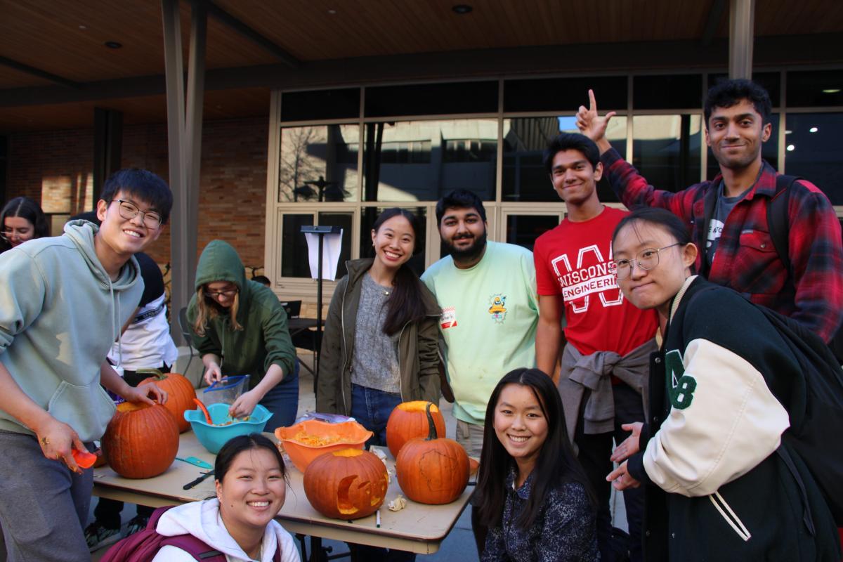 Group photo outside of Union South for pumpkin carving.