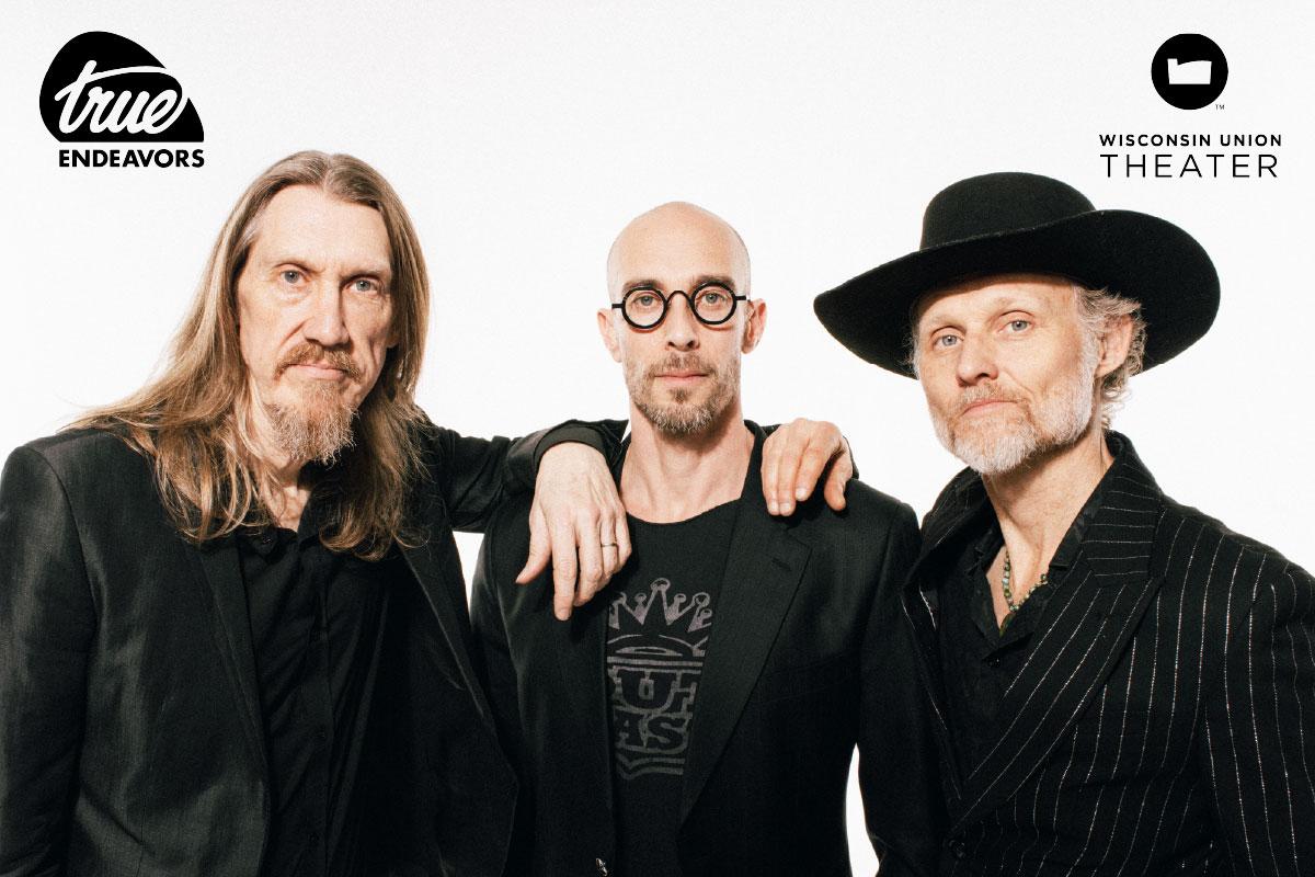 Photo of The Wood Brothers in front of a white background