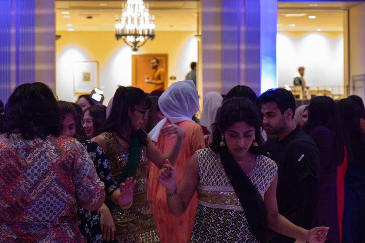 Students hit the dance floor during the Pakistani Student Association's "Mock Mendi" event.