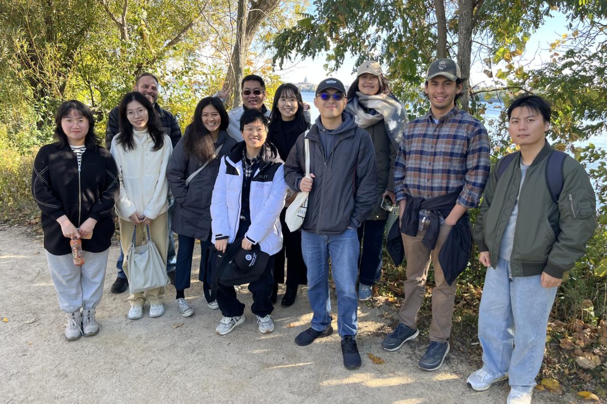 A group of individuals on a hike at Picnic Point.