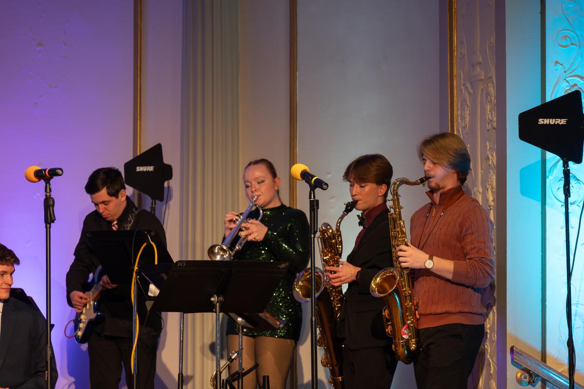 Wisconsin Singers band playing music for the 2025 Frosty Feast