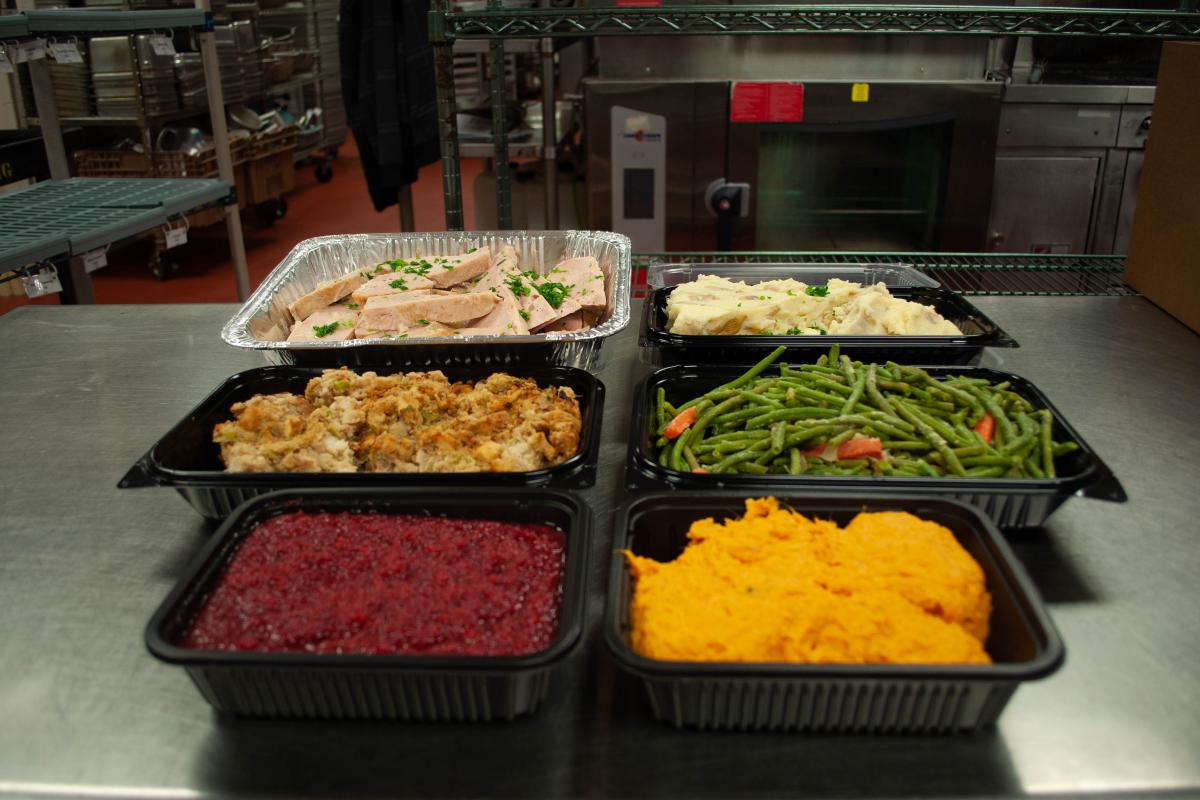 thanksgiving to go ham, mashed potatoes, stuffing, green beans, cranberry relish and sweet potatoes