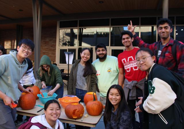 Group photo outside of Union South for pumpkin carving.