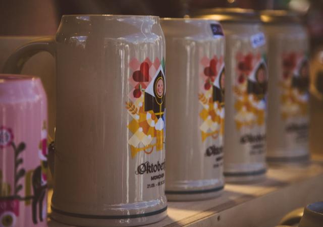 Oktoberfest steins sitting in a row