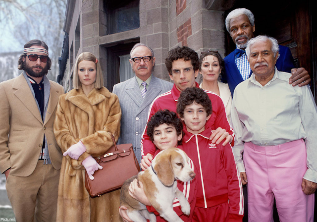 Still from film The Royal Tenenbaums. Family poses for a photo.