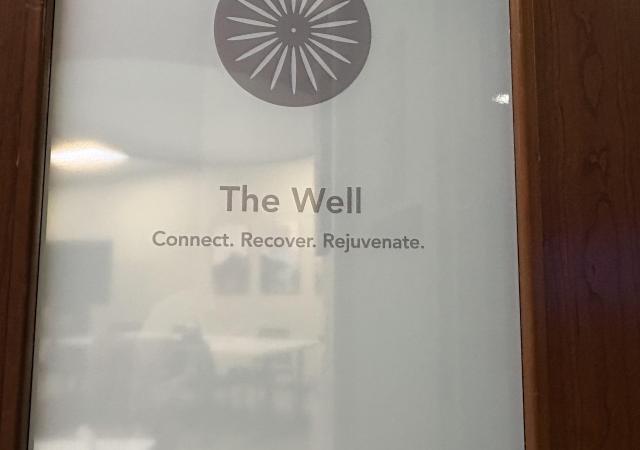 The Well door signage