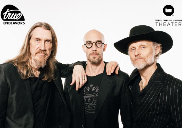 Photo of The Wood Brothers in front of a white background