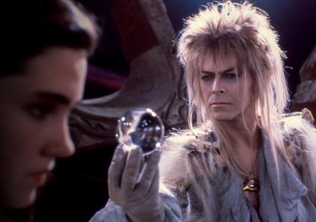 Still from film Labyrinth (1986), the goblin king holds a clear orb.