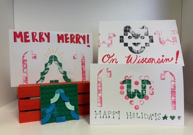 Three samples of Lego block prints in from of a white background.