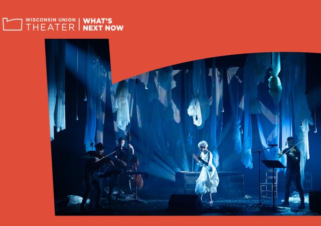Photo of performers on stage with a red background.
