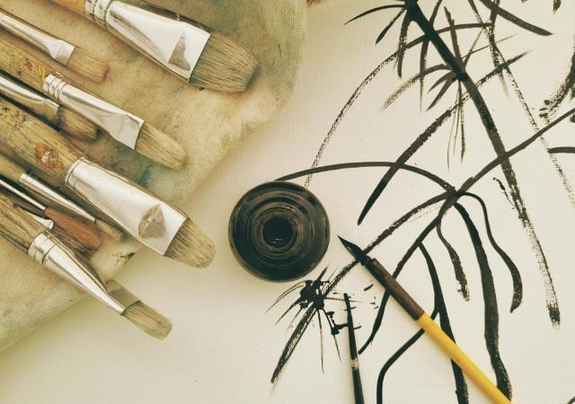 Paintbrushes with ink paint.