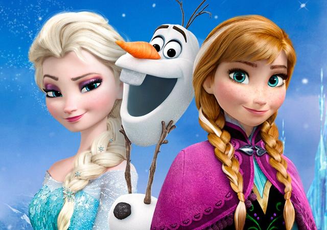 Still from film Frozen. Elsa, Anna, and Olaf stand next to each other.