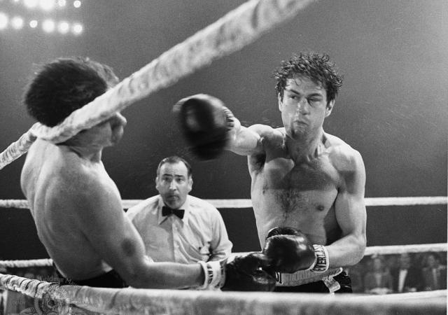 Still from film Raging Bull, men box in the ring.