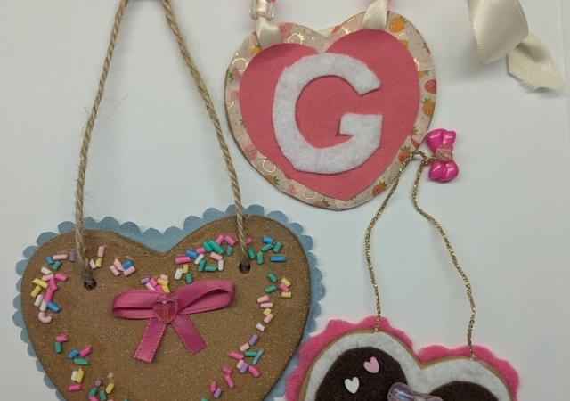 Photo of decorated clay hearts.