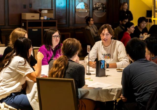 students sitting around a table