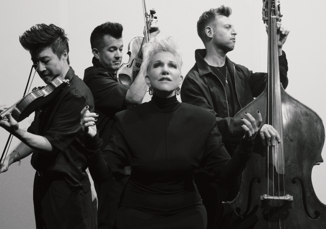 Black and white photo of Time for Three and Joyce DiDonato.