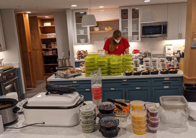 volunteer prepping meals at Ronald McDonal House kitchen