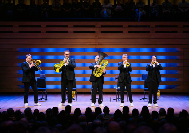 Photo of Canadian Brass performing on stage.