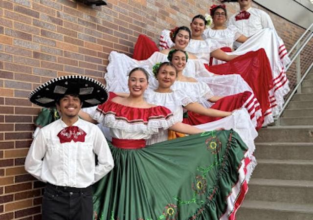 UW Grupo Folklorico group posing on stairs