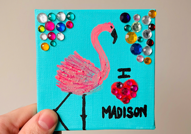 Photo of a painting with a flamingo with the words "I love Madison".