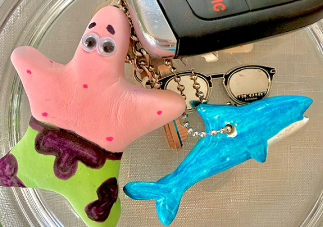 Photo of two sea creatures made from clay and painted.
