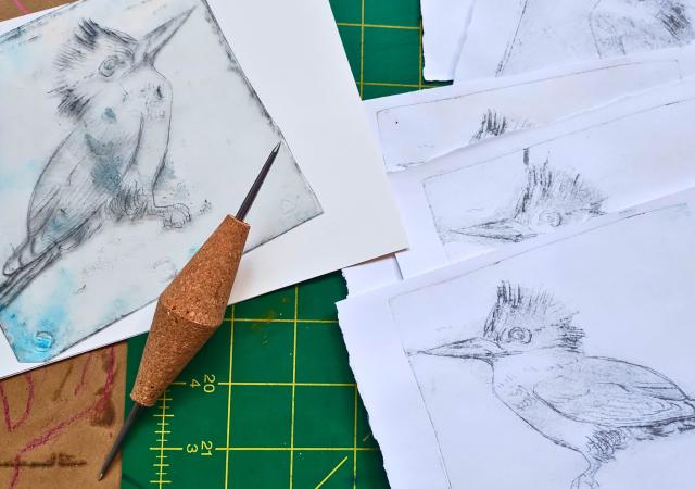 Photo of drypoint printing with images of birds.