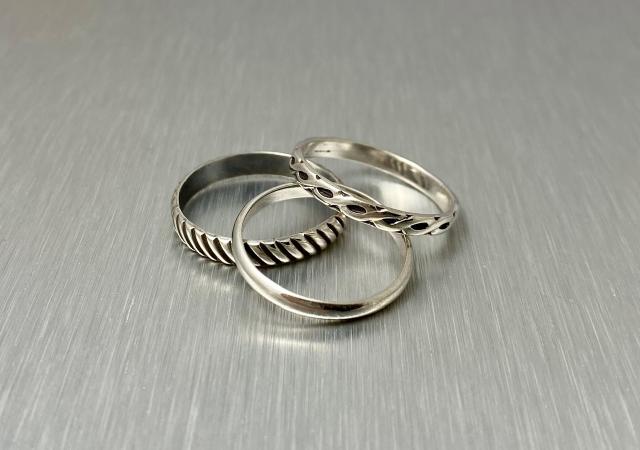 Photo of three rings made from metal.