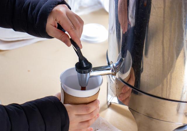 Hot Cocoa being poured into a cup