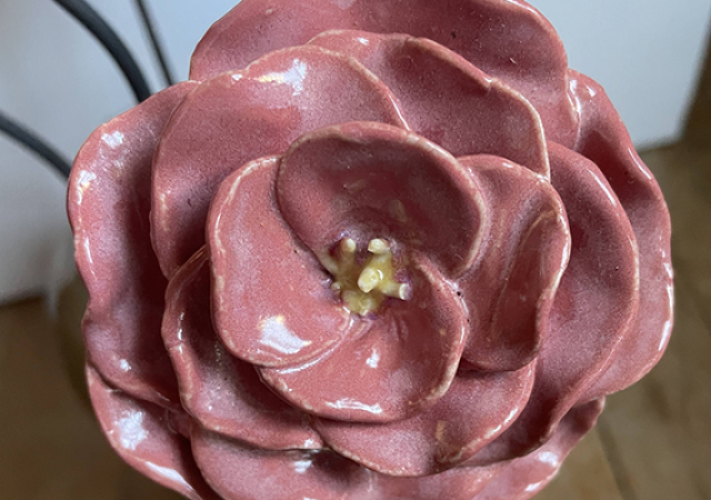 Photo of a clay pink flower.