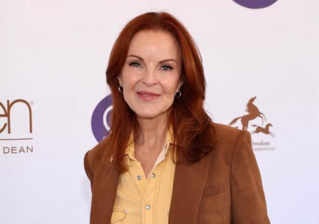 Image of Marcia Cross, a woman with red hair down to her shoulders