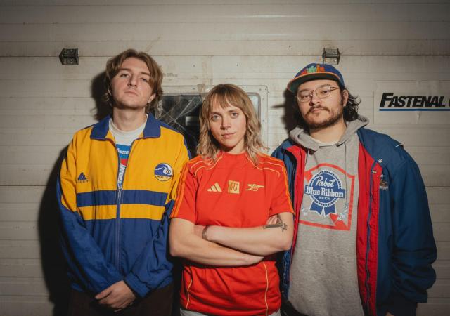 Dicot band photo, three members stood together