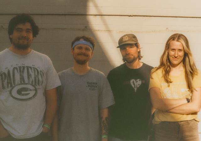 Liquid Mike band photo featuring all four members.