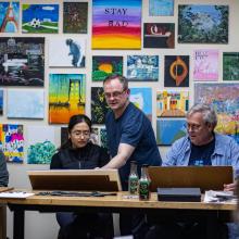 Art instructor with students at Wheelhouse Studios