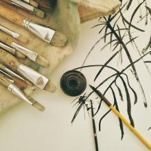 Paintbrushes with ink paint.